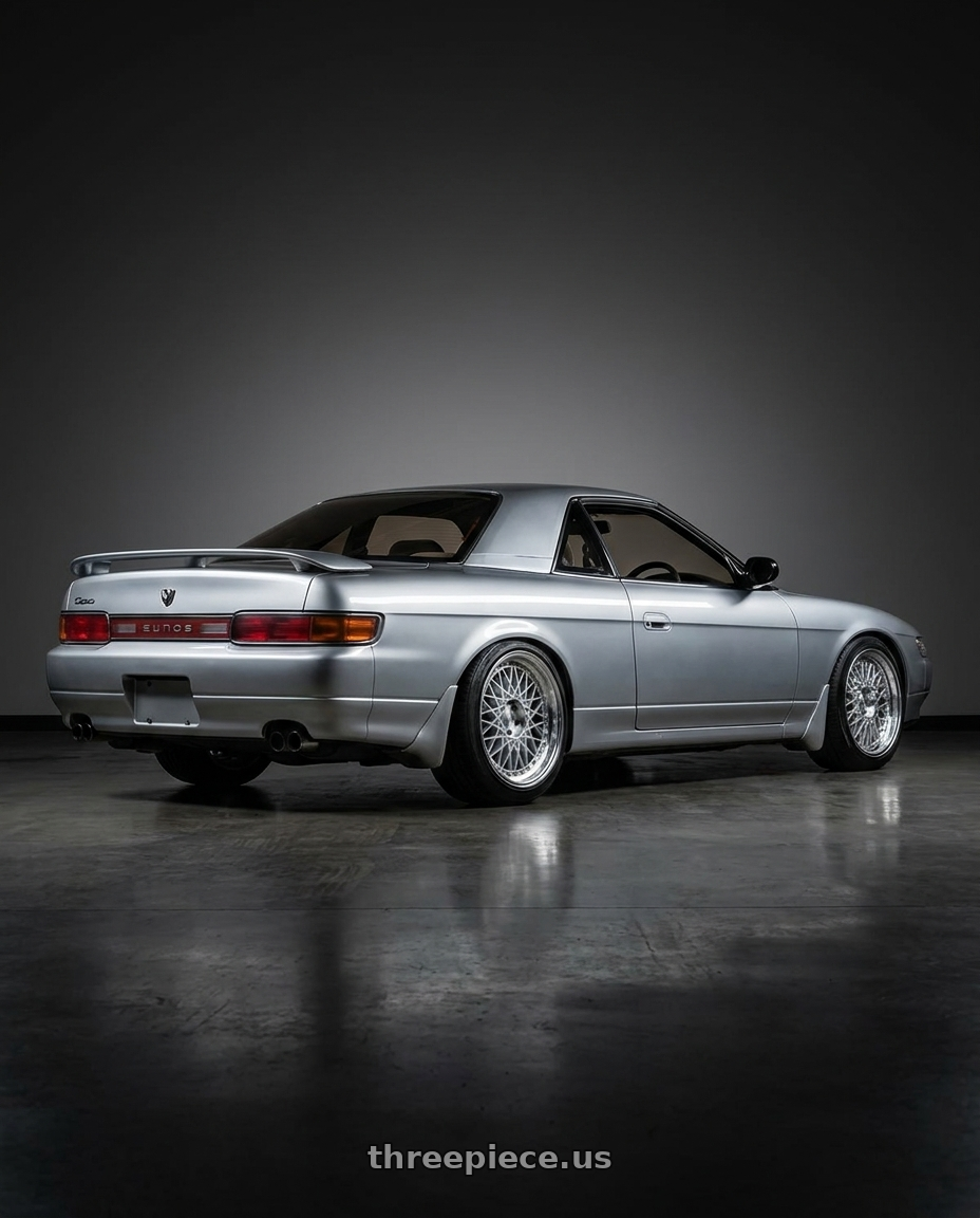 1990 eunos cosmo with Aodhan AH05 5x114.3 18x9.5+35 Silver w/Machined Face wheels rear three quarter view slight stretch tires
