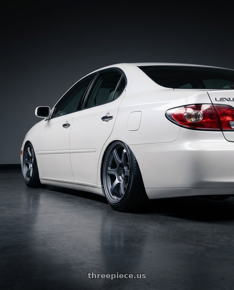 2005 Lexus ES330 with Gram Lights 57DR 5x114.3 17x9.0+12 Gunblue II wheels rear three quarter view slight stretch tires