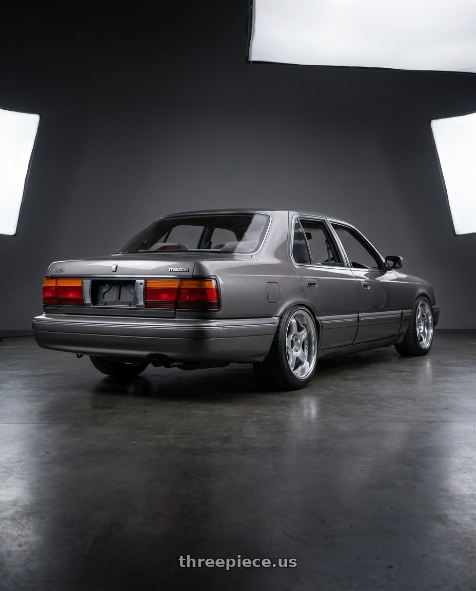 1991 Mazda 929 with SSR Professor SP1R 5x114.3 17X7 37 NR Disk Silver wheels rear three quarter view meaty tires