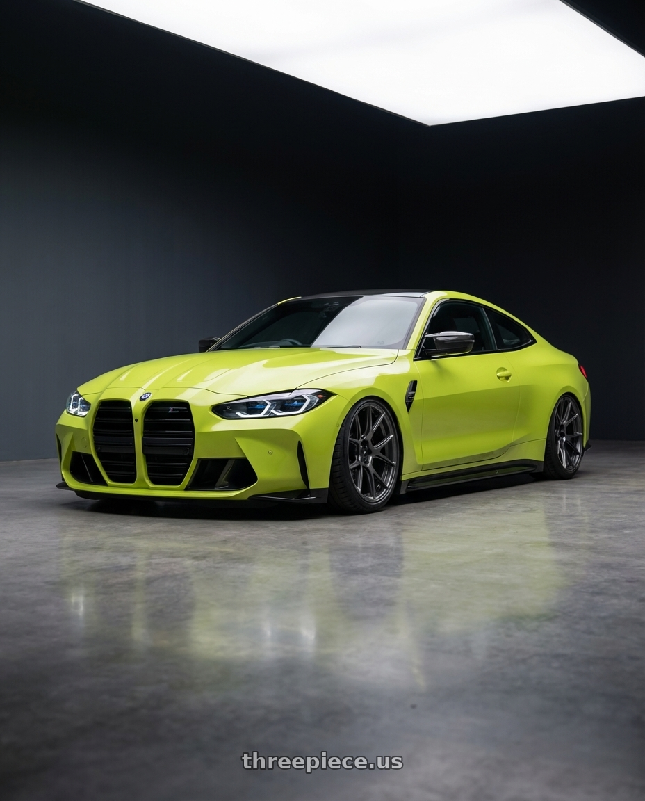 2024 BMW M4 G82 with Konig Ampliform 5x112 19x8.5+32 Dark Metallic Graphite wheels front three quarter view stanced stance