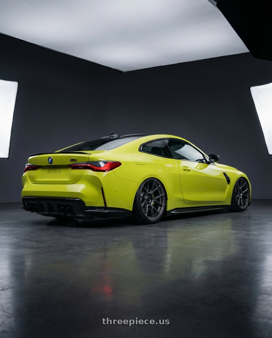 2024 BMW M4 G82 with Konig Ampliform 5x112 19x8.5+32 Dark Metallic Graphite wheels rear three quarter view slight stretch tires