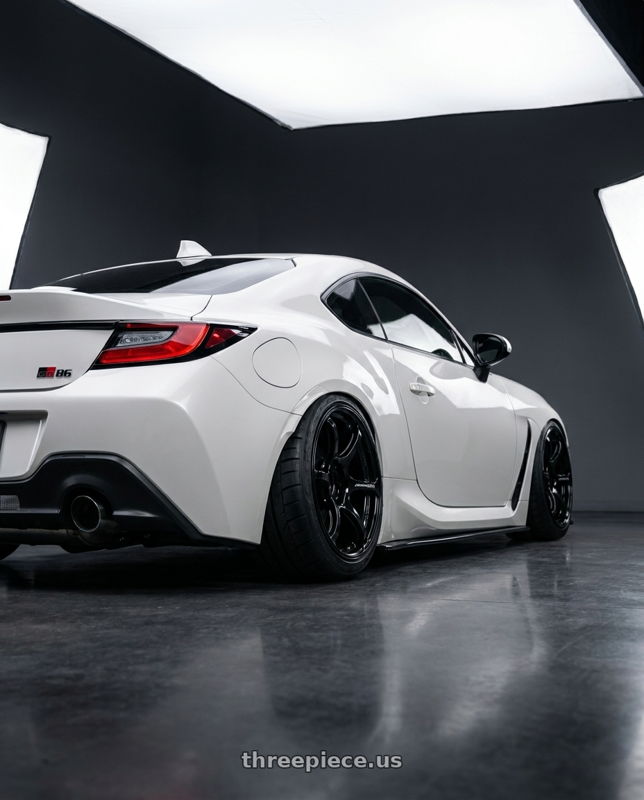 2024 toyota gr86 with Advan RGIII 5x112 18x8+50 Gloss Black wheels rear three quarter view meaty tires