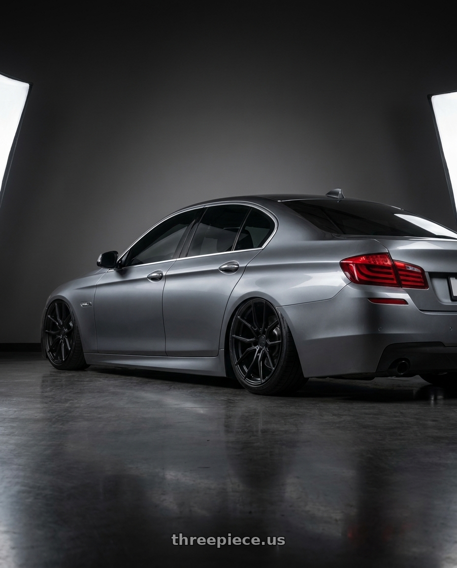 2016 BMW 5 Series F10 with Aodhan AFF1 5x120 20x9+30 Matte Black wheels rear three quarter view slight stretch tires