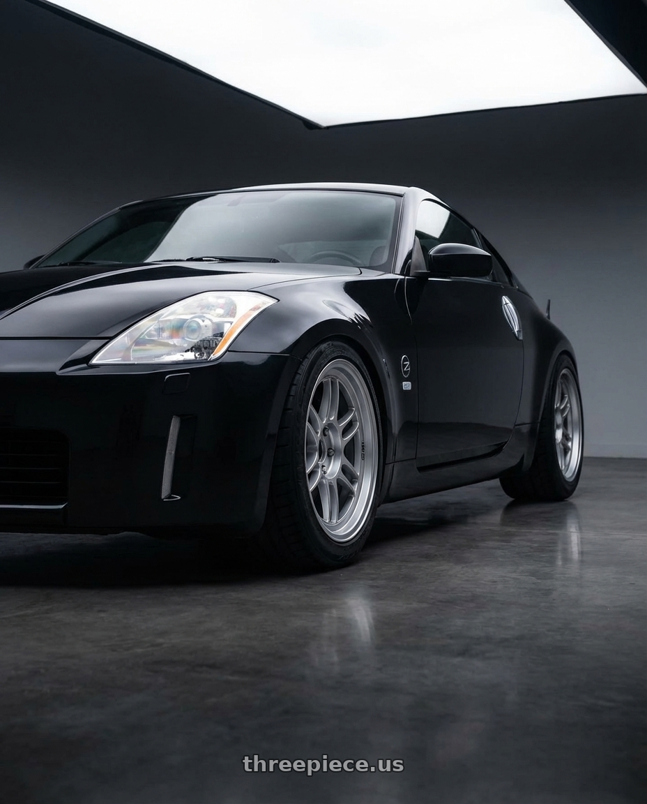 2009 nissan 350z with Enkei RPF1 5x112 18x8+35 Silver wheels