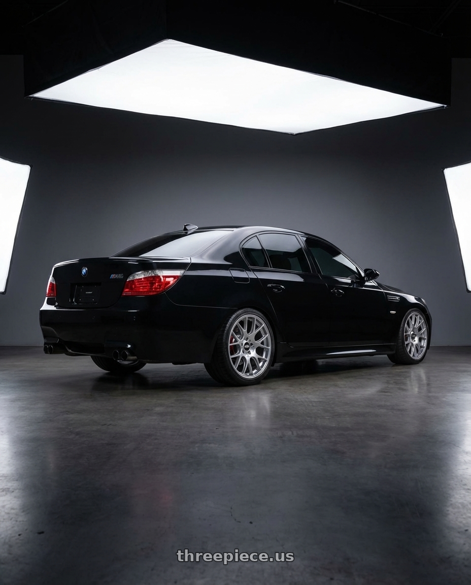 2006 BMW M5 with BBS CH-R 5x120 20x10.5 +24 Brilliant Silver Polished Rim Protector wheels rear three quarter view square tires