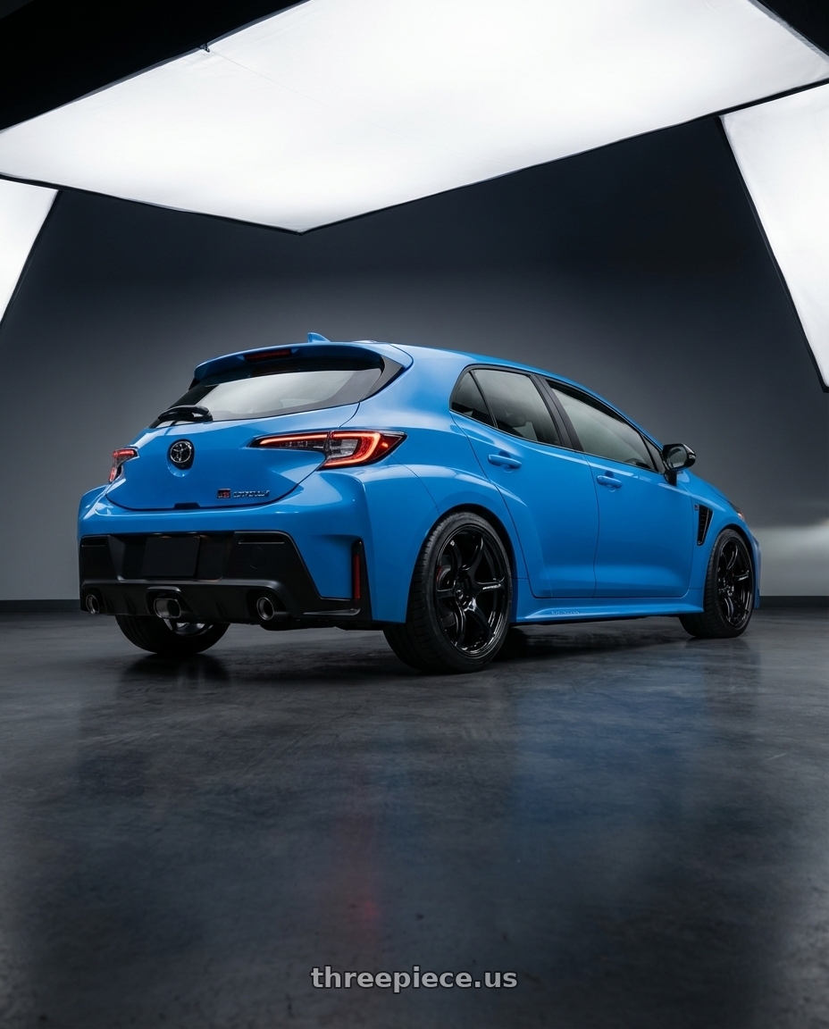 2024 Toyota GR Corolla with Advan RGIII 5x114.3 18x9.0+35 Gloss Black wheels rear three quarter view square tires