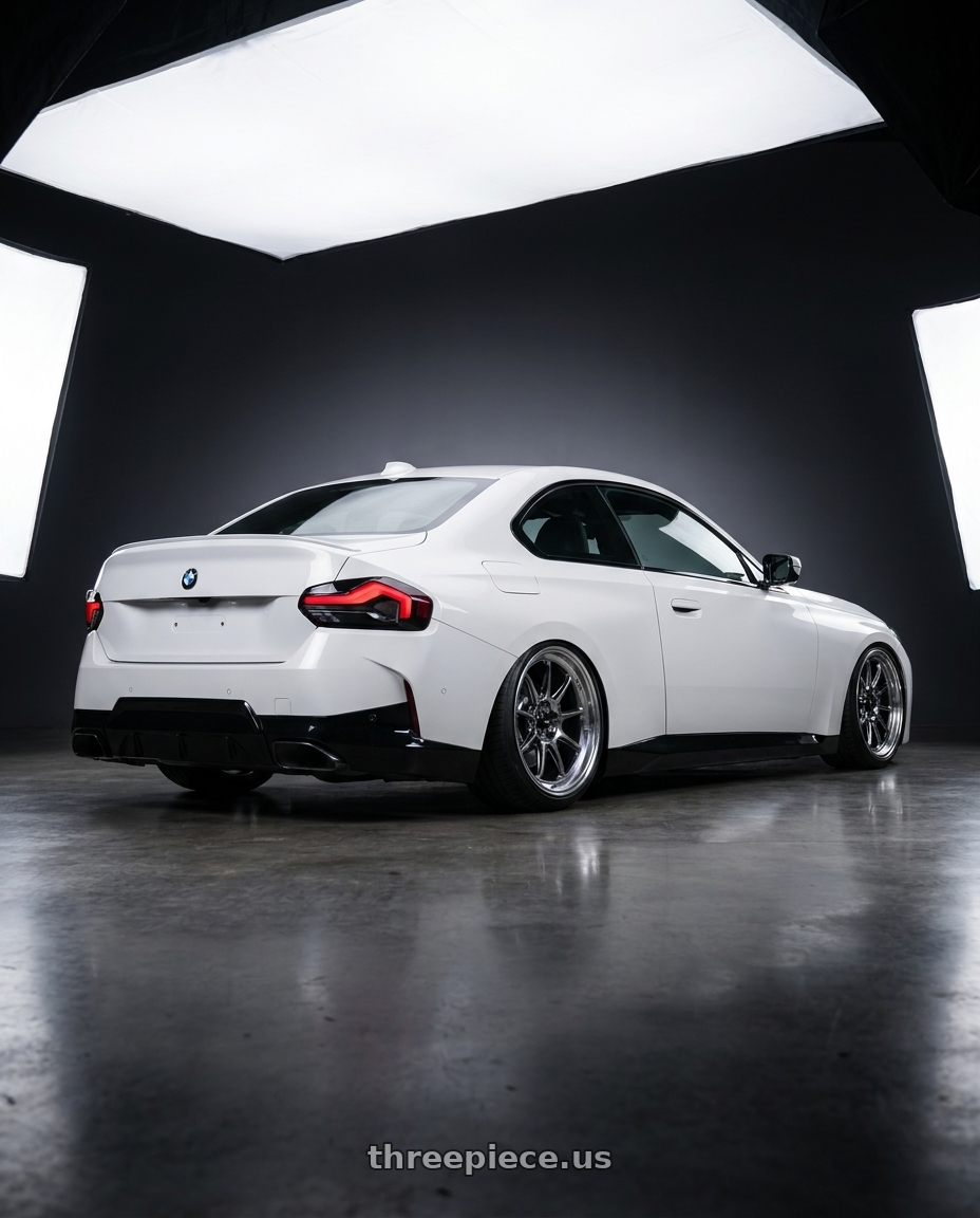 2024 BMW 2 Series G42 with Konig Countergram 5x112 19x11+40 Hyper Chrome / Machined Lip wheels rear three quarter view slight stretch tires