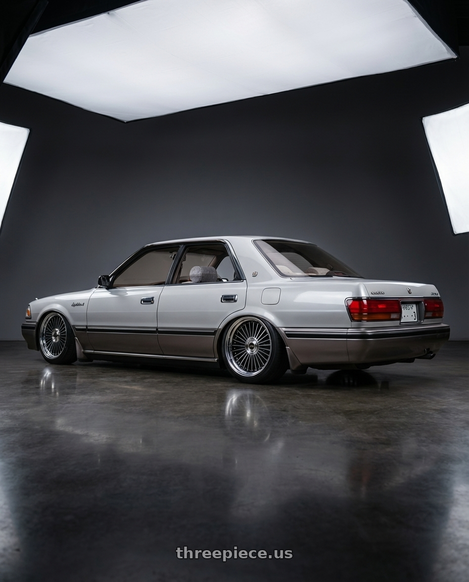 1991 Toyota Crown with Work Emitz Black Polish 5x114.3 19x8.0 +45 wheels rear three quarter view square tires