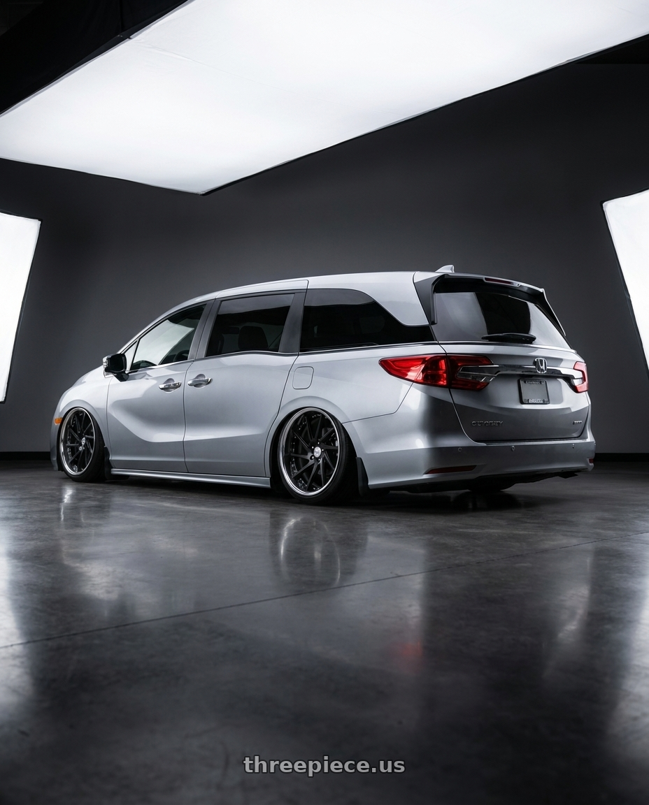 2024 honda odyssey  with Work Gnosis Cvs 5x120 20x8+45 A Disk Matte Black wheels rear three quarter view extreme stretch tires