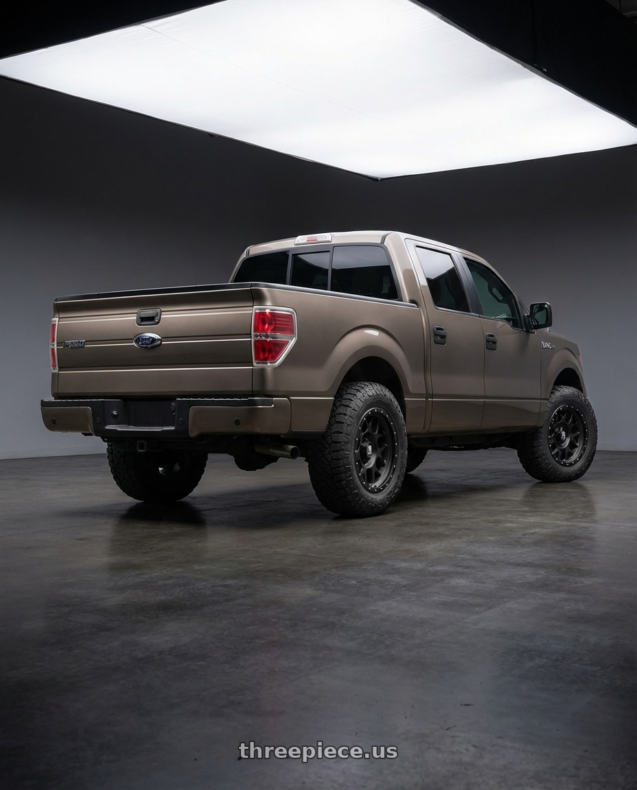 2013 Ford F-150 with XD XD127 BULLY 6X135 20X9 +18 SATIN BLACK WITH REINFORCING RING wheels rear three quarter view meaty tires