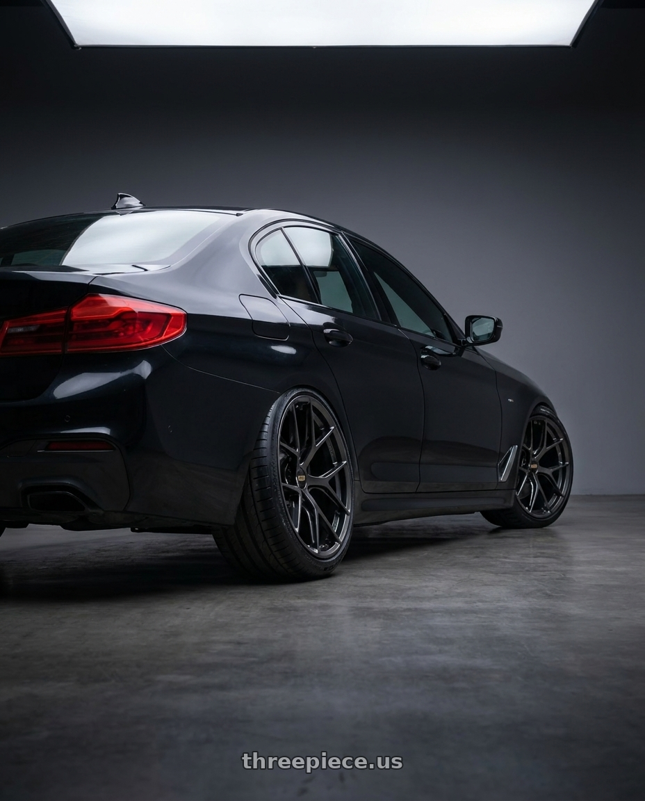 2019 BMW 5 series  with BBS FI-R 5x112 20x9.0+35 Diamond Black wheels rear three quarter view slight stretch tires