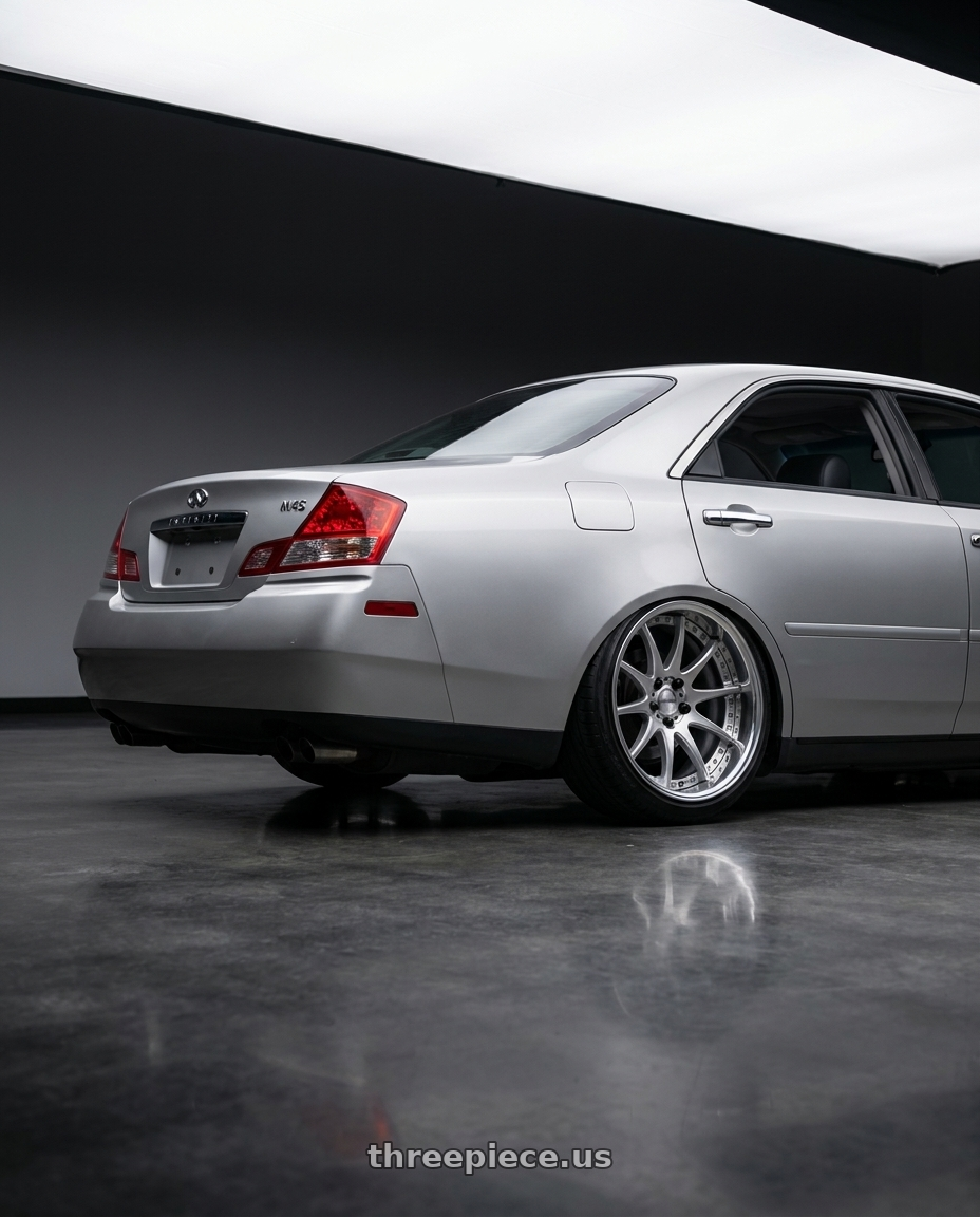 2004 Infiniti M45 with Work Emotion Cr 3P 5x100 19x11+2 R Disk Burning Silver wheels rear three quarter view extreme stretch tires