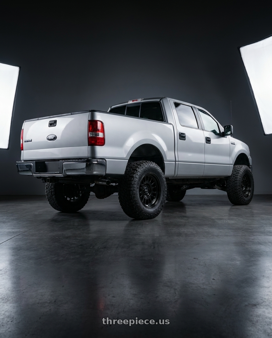2005 Ford f150 supercrew with Method Race Wheels 318B 6X135 17x8.5 +0 GLOSS BLACK wheels rear three quarter view meaty tires