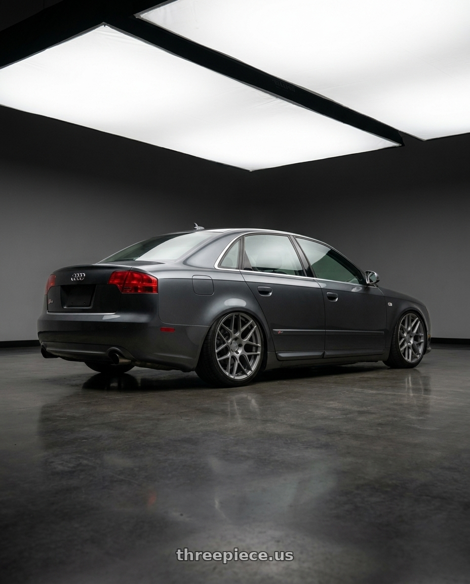 2005 Audi s4 sedan dark grey with Aodhan AFF2 5x112 19x8.5+35 Matte Gray wheels rear three quarter view slight stretch tires