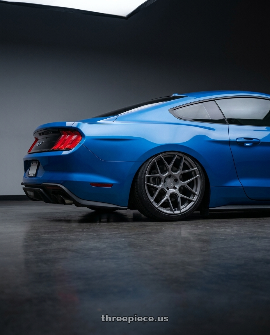 2022 Ford Mustang GT with Aodhan AFF2 5x114.3 19x8.5+35 Matte Gray wheels rear three quarter view slight stretch tires