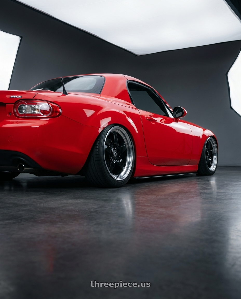 2012 Mazda MX-5 Miata NC with Forgestar D5 Drag 5x114.3 17x10 +50 Gloss Black Machined wheels rear three quarter view slight stretch tires