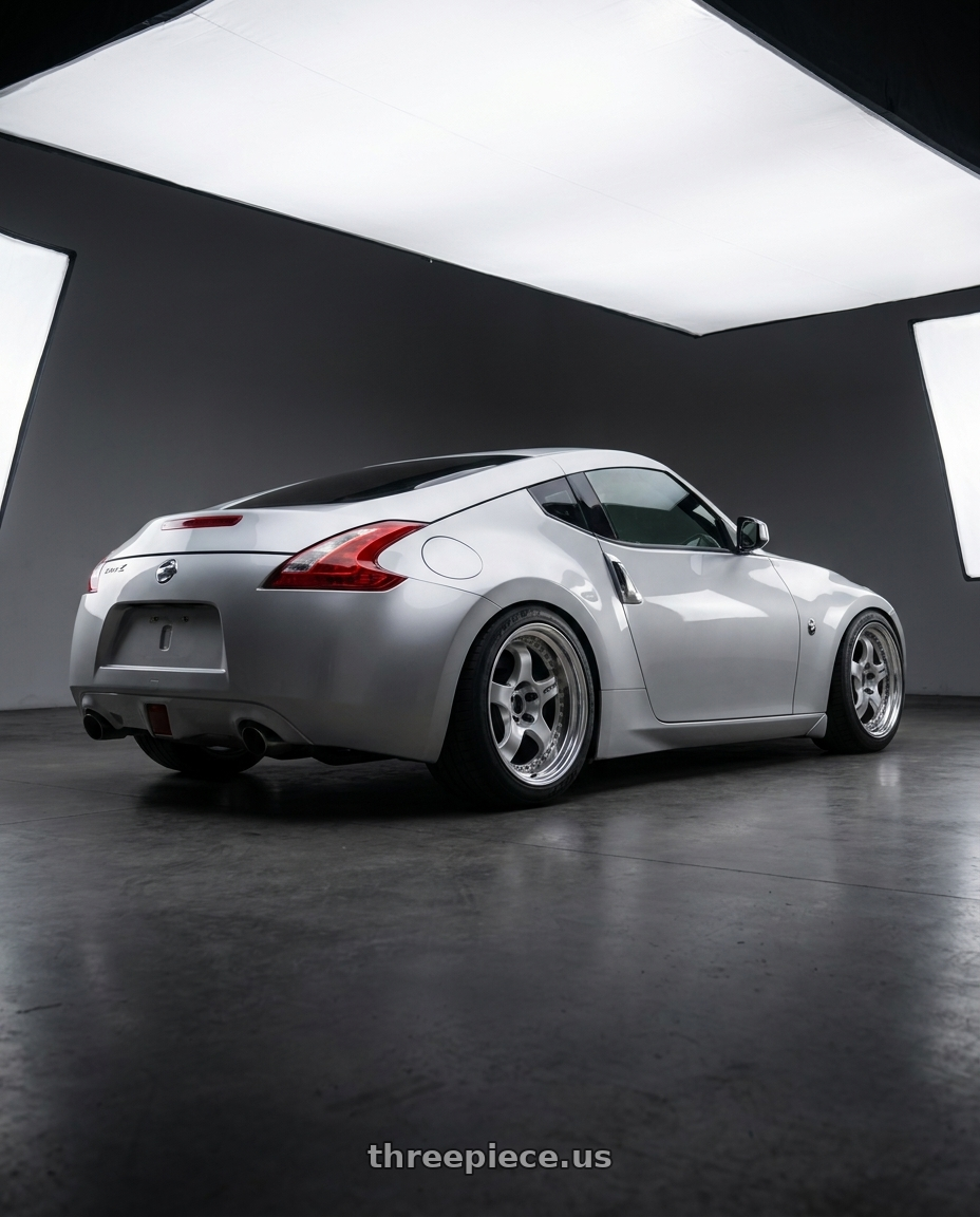 2016 Nissan 370z sport  with Work Meister S1 3P 5x114.3 19x10+24 T Disk Silver wheels rear three quarter view meaty tires