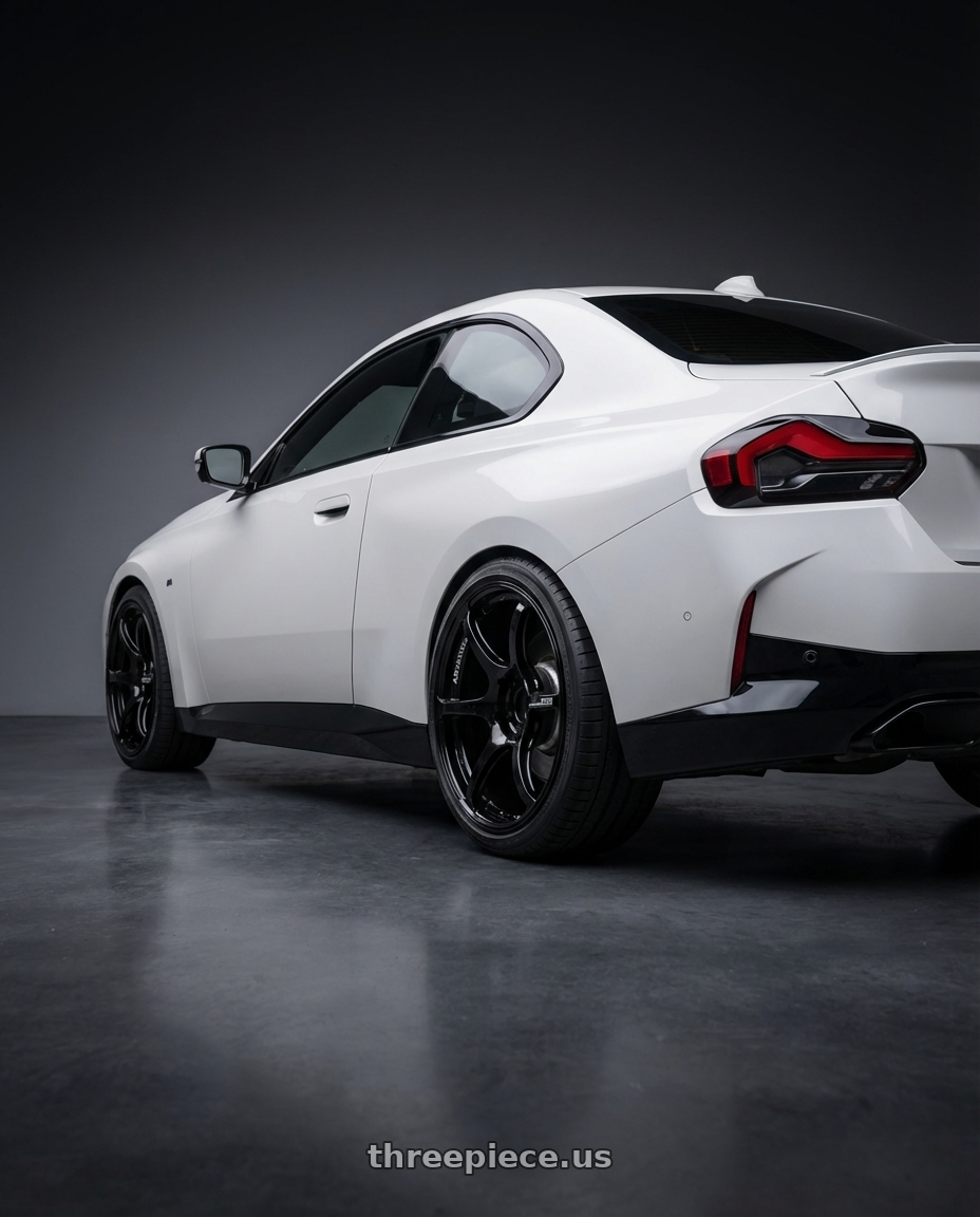 2024 BMW 2 Series G42 with Advan RGIII 5x112 19x8.5+45 Gloss Black wheels rear three quarter view square tires