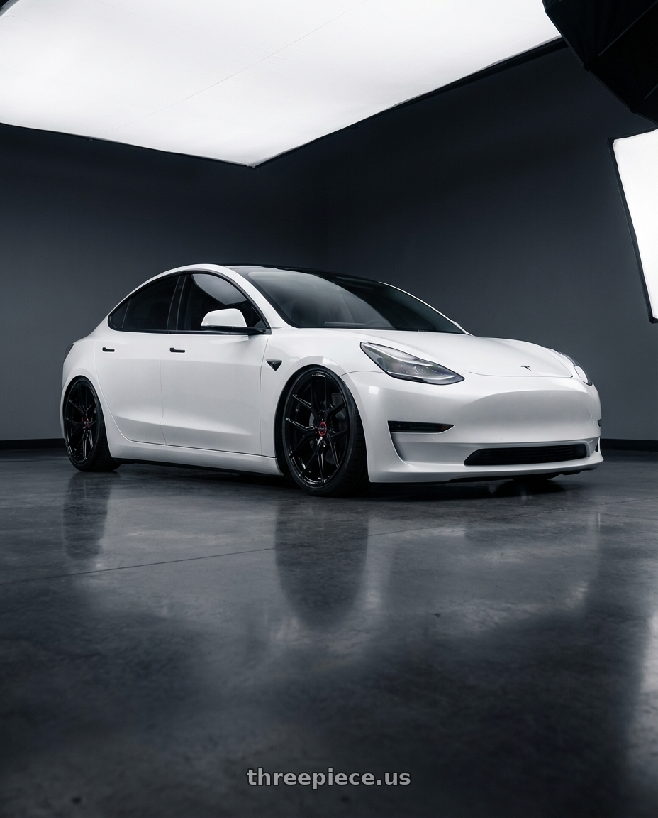2023 Tesla Model 3 with Vossen HF-5 19x9.5 / 5x114.3 / ET40 / Deep Face / 73.1 - Gloss Black Wheel - HF5-9N63 wheels front three quarter view stanced stance