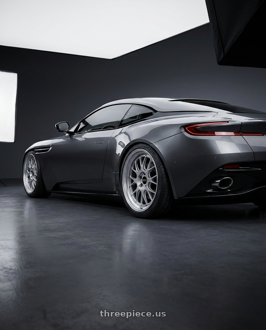 2019 Aston Martin DB11 with BBS LM-R 5x114.3 19x8.5+25 Diamond Silver wheels rear three quarter view square tires