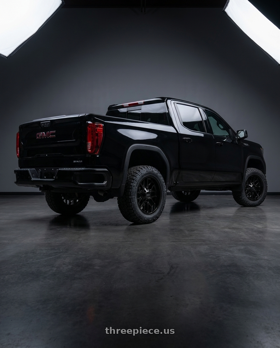 2024 GMC sierra with RTX Slate 6x139.7 20x9 +20 Satin Black wheels rear three quarter view square tires