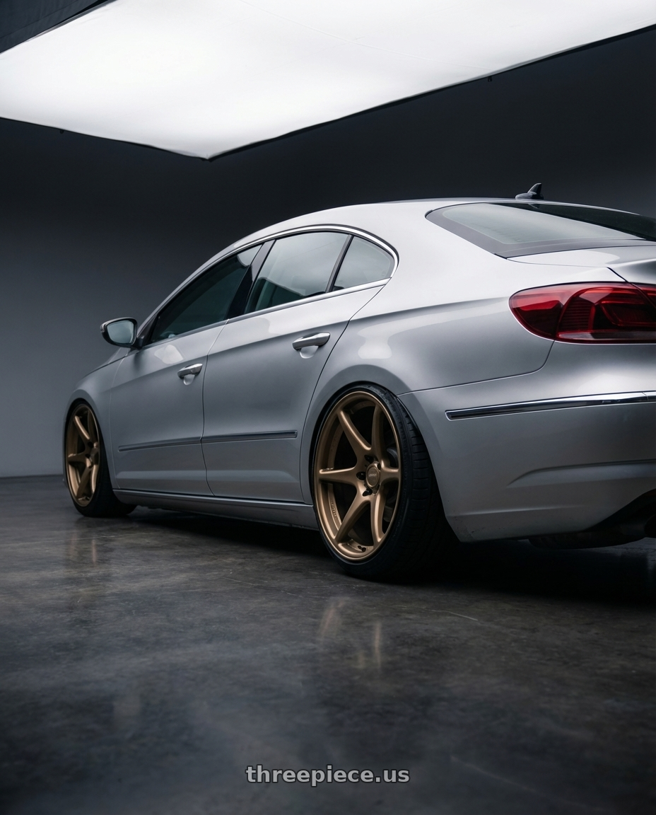 2015 Volkswagen CC with Kansei K11B Tandem 5X112 19x10.5 22 Bronze wheels rear three quarter view slight stretch tires