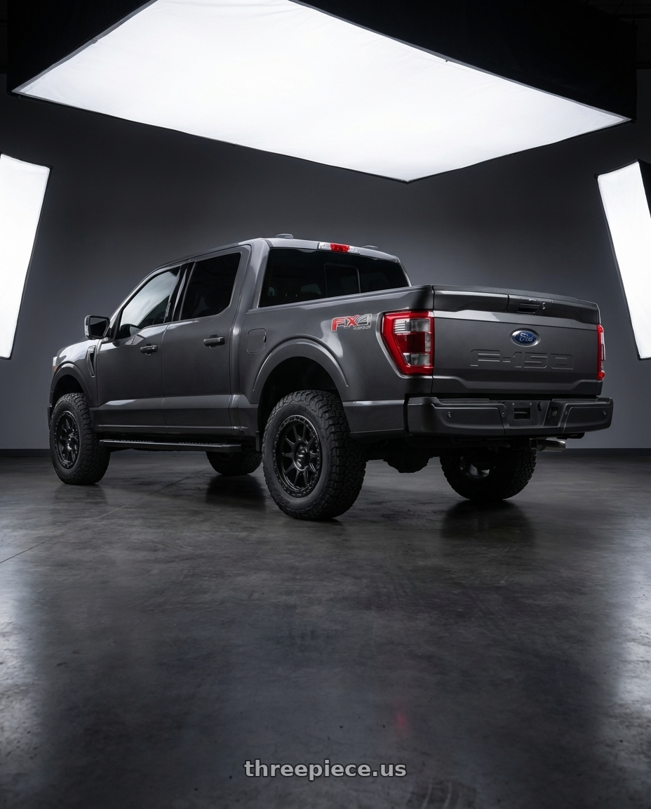 2021 ford f150 with MVX OFFROAD VX12 6X135 17x9 +0 Matte Black wheels rear three quarter view square tires