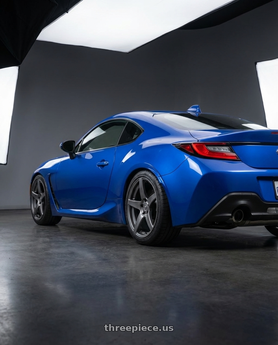 2024 Subaru BRZ with Forgestar CF5 5x114.3 18x10 +42 Gloss Anthracite wheels rear three quarter view square tires