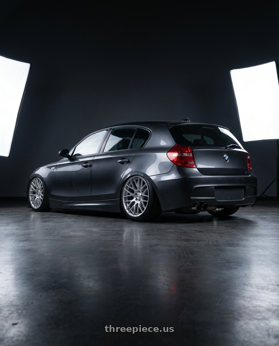 2012 BMW 1 Series E82 with Avant Garde Wheels M359 5X120 19x11 +25 Hyper Silver wheels rear three quarter view slight stretch tires