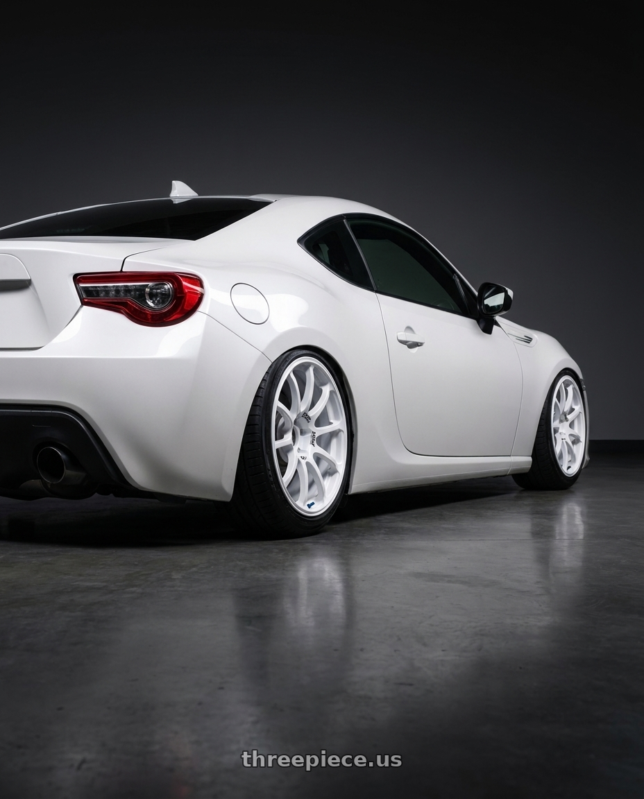2016 Scion FR-S with Advan RCIII 5x100 17x7+43 White wheels rear three quarter view slight stretch tires