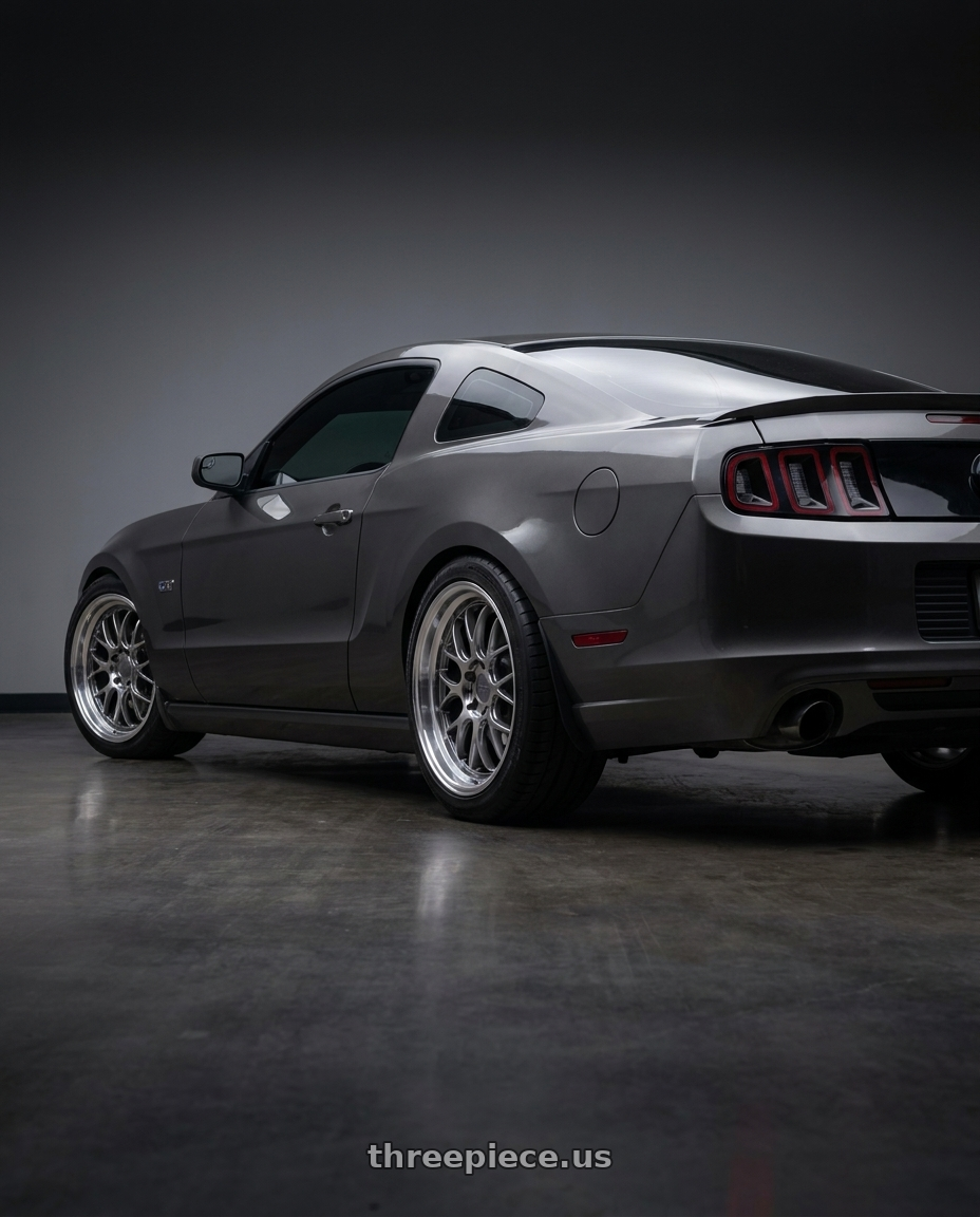 2014 Ford Mustang GT with F1R F21 5x114.3/5x120 19x9.5 +35 Hyper Black/Polish Lip wheels rear three quarter view square tires