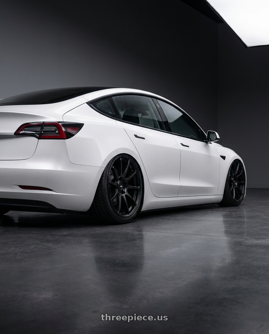 2023 Tesla Model 3 with Ssr Gtv02 5x114.3 19x8.5+38  FLAT BLACK wheels rear three quarter view slight stretch tires