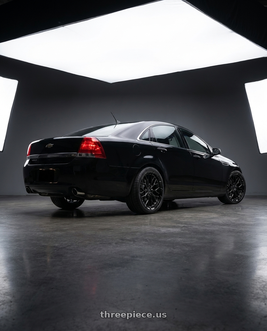 2014 Chevy caprice ppv with DOLCE PERFORMANCE MAGARI 5x120 19x8.5 +28 Gloss Black wheels rear three quarter view square tires
