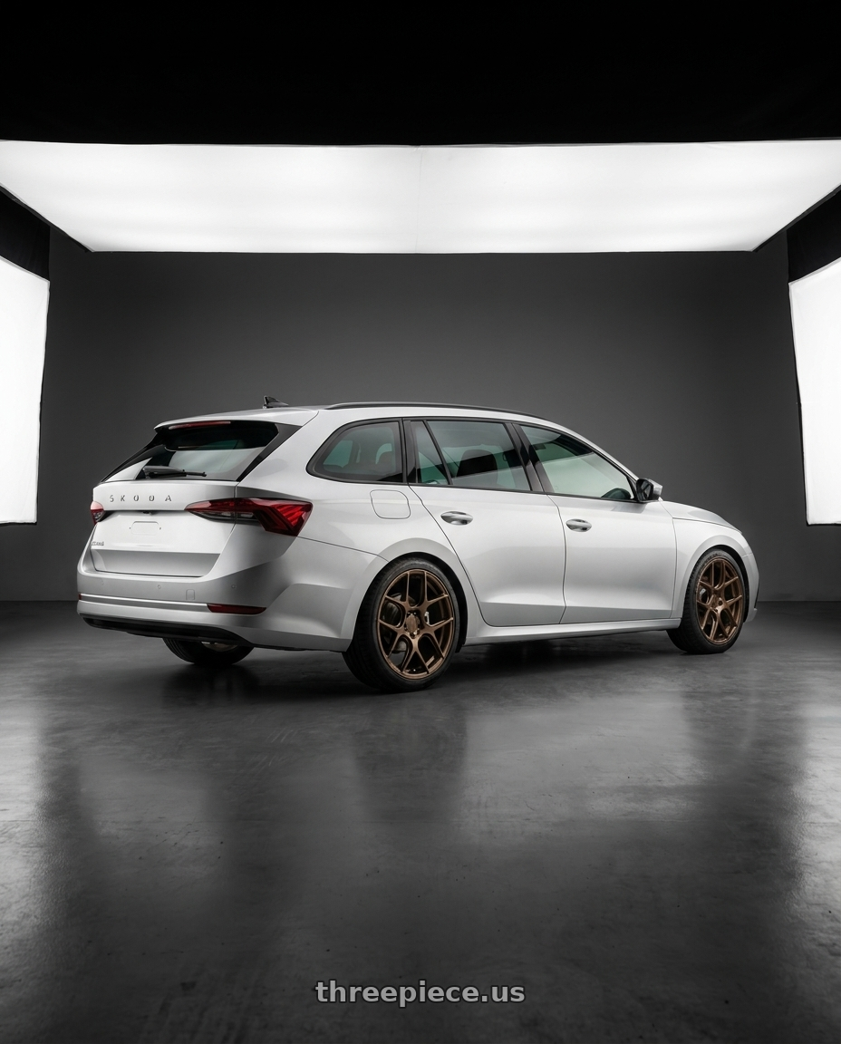 2025 Skoda Octavia Combi with MRR FS1 5x130 18x8.5  +45 Gloss Bronze wheels rear three quarter view square tires