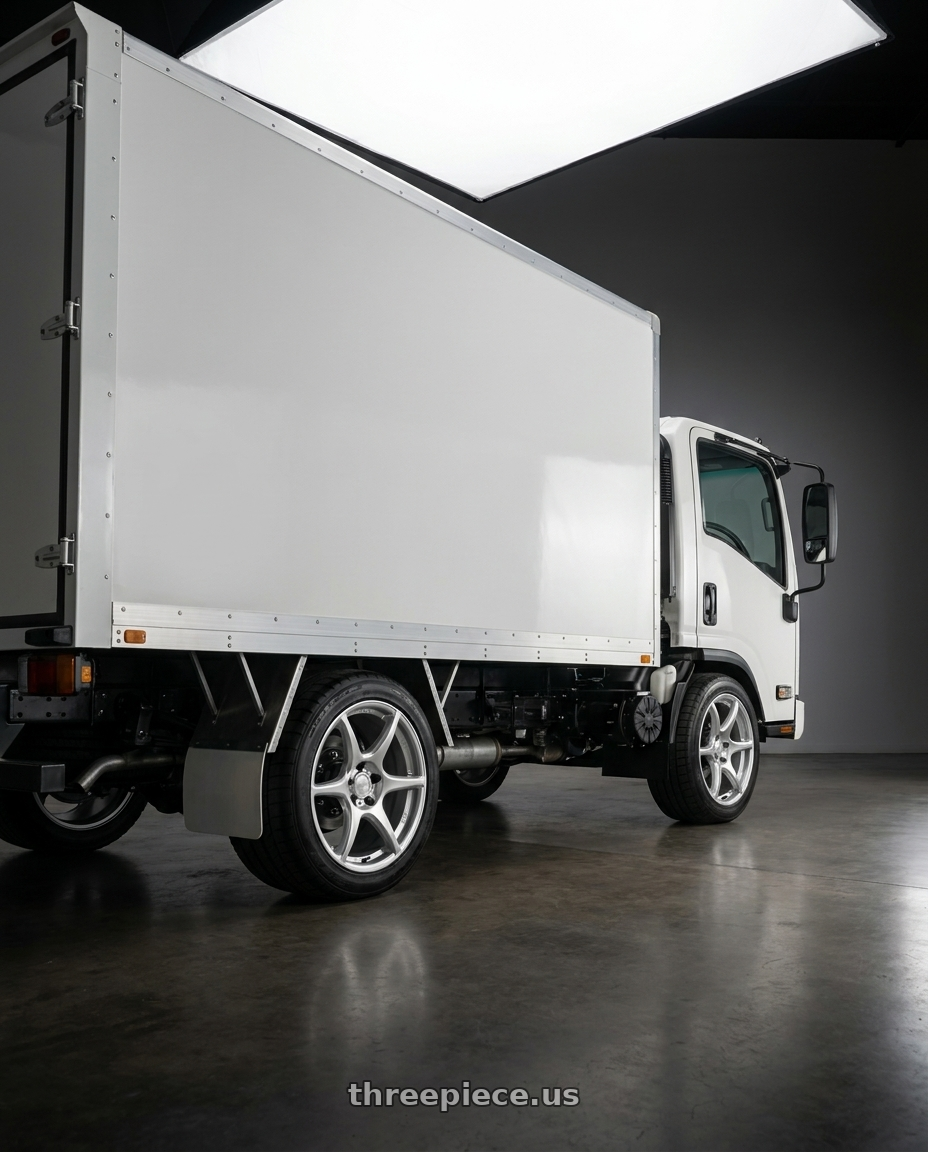 2024 Isuzu Npr50 with Kansei K11S Tandem 5X120 18x8.5 35 Hyper Silver wheels rear three quarter view square tires
