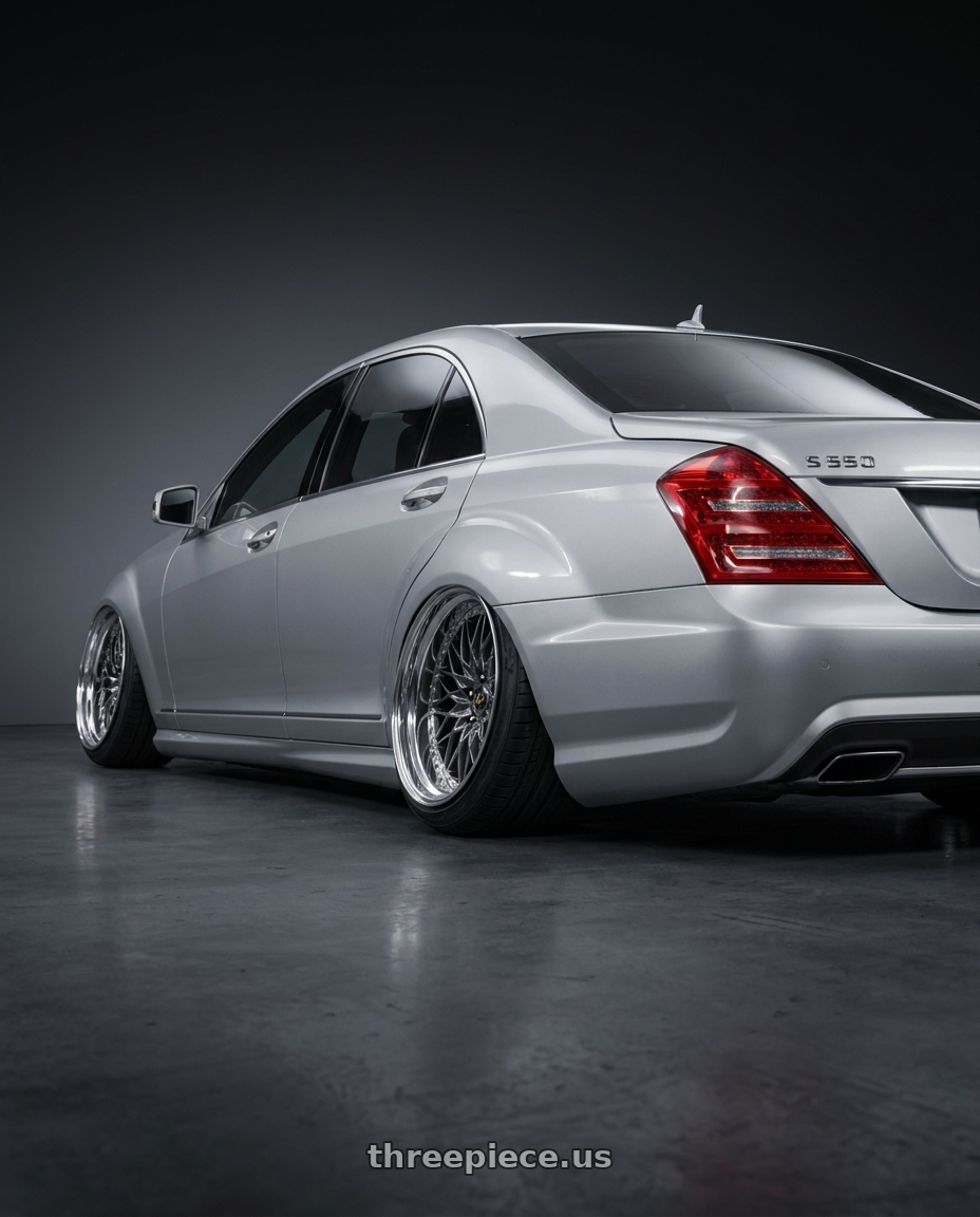2012 Mercedes S550 with Work Vs-Xv 5x100 18x12+1 A Disk Brilliant Silver Black wheels rear three quarter view extreme stretch tires