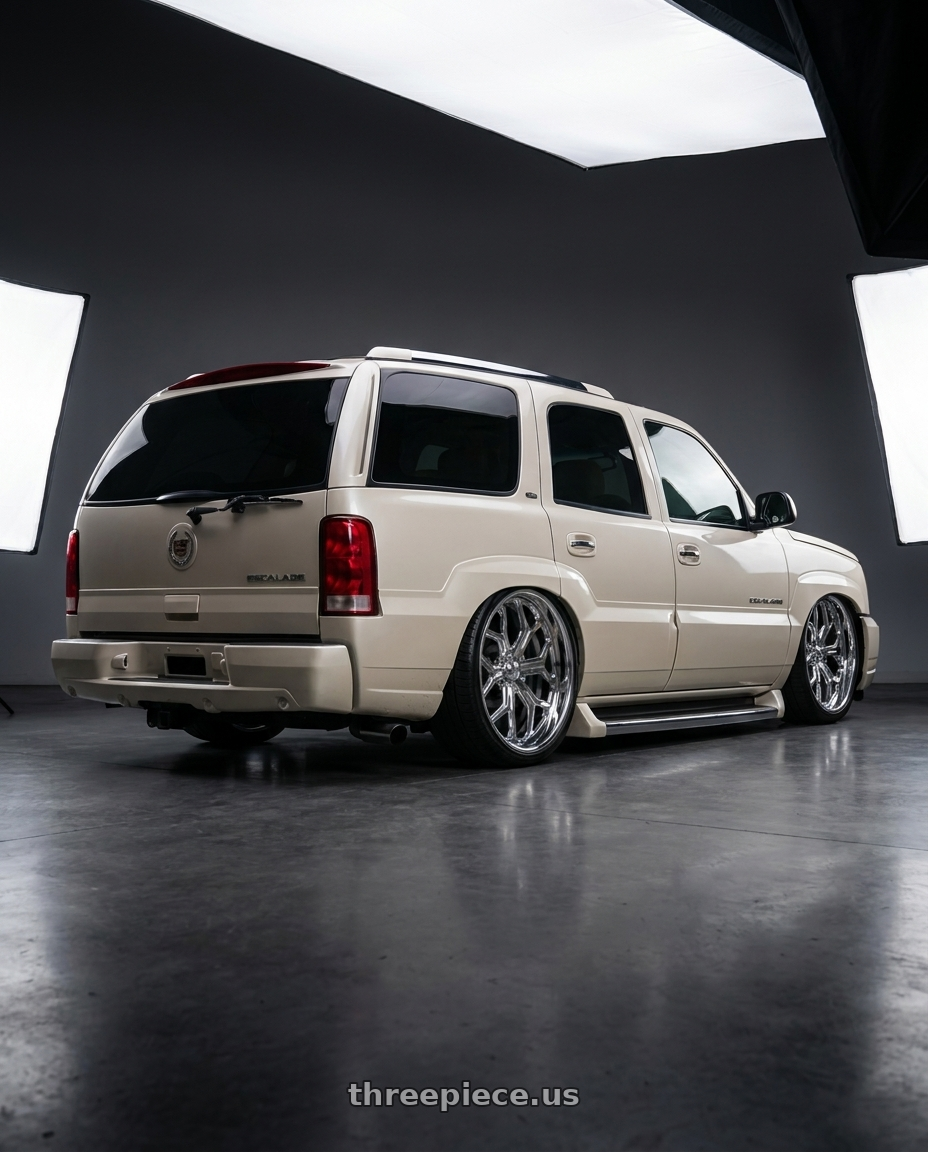 2005 Cadillac Escalade with Center Line ST06 6X139.7 26x10 +25 Polished wheels rear three quarter view extreme stretch tires