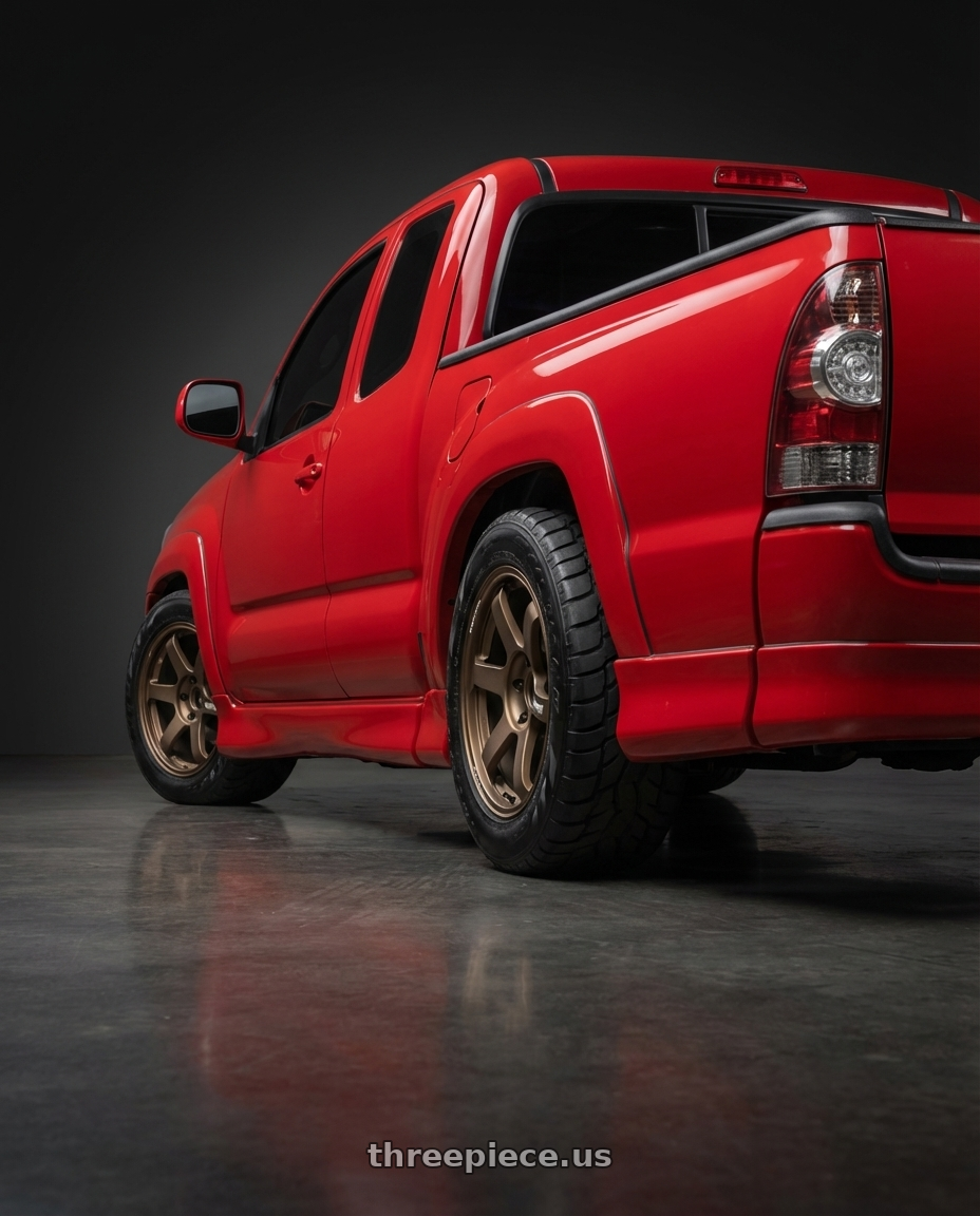 2007 Tacoma x runner  with Volk Racing TE37 Saga S-Plus 5x100 18x7.5+48 Bronze wheels rear three quarter view meaty tires