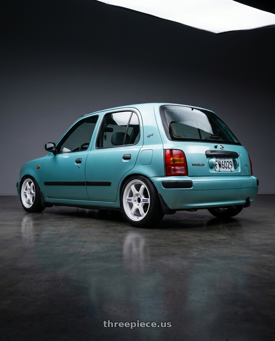1996 NISSAN MARCH Tiffany Blue with Volk Racing TE37 Gravel 5x114.3 15x7.0+35 White wheels rear three quarter view square tires