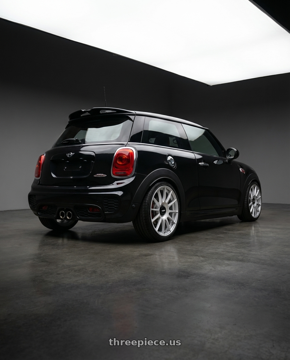 2015 F56 Mini Hatch JCW with Rotiform 1PC R170 DTM 5X112/5X120 17X8 +40 SILVER wheels rear three quarter view square tires