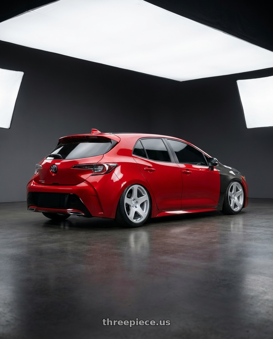 2022 Corolla sport with Rotiform RC200 NUE 5X120 20x10 +40 GLOSS SILVER wheels rear three quarter view slight stretch tires