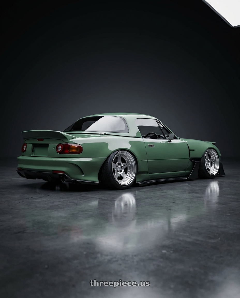 1997 mazda miata with Work Meister Cr01 4x100 16x10+-28 A Disk Bright Buff Finish wheels rear three quarter view slight stretch tires
