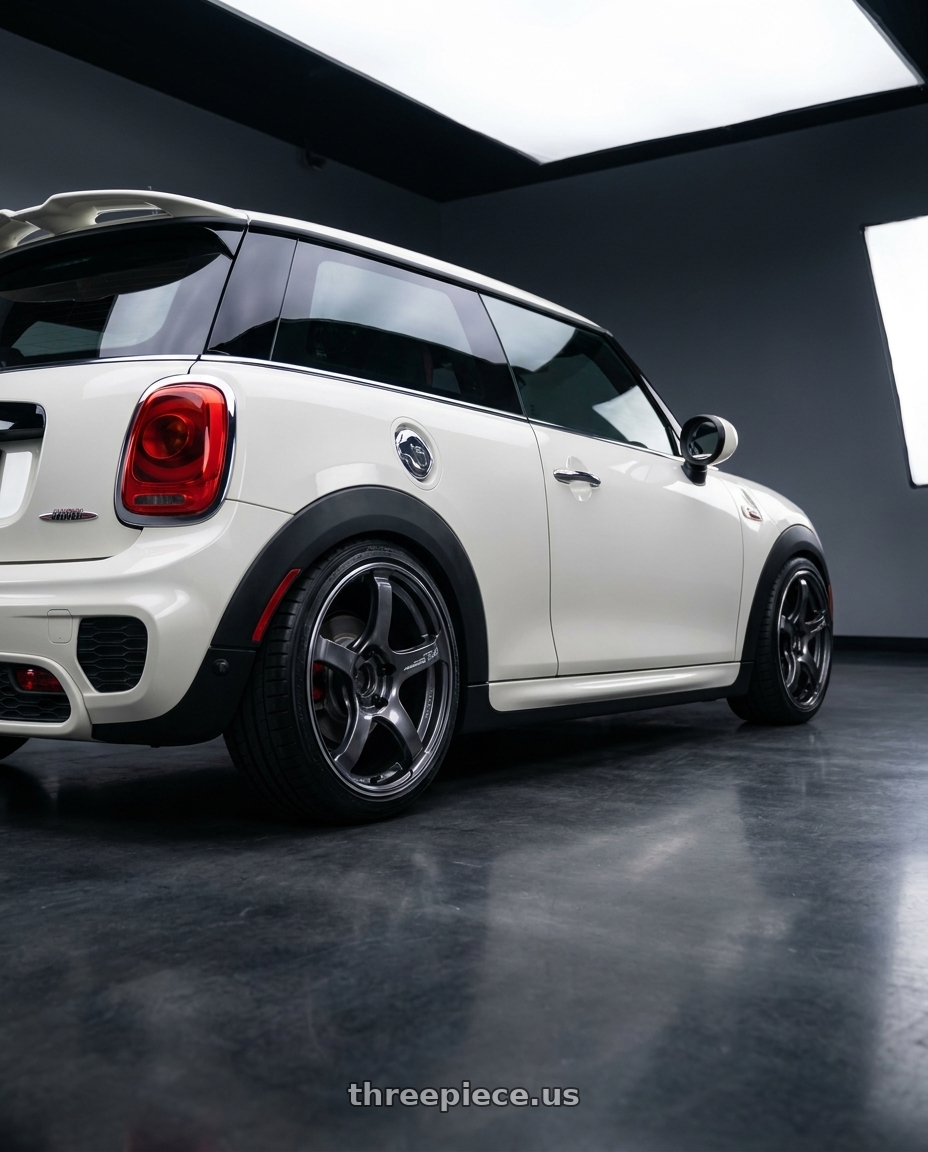 2017 mini cooper jcw with Advan Racing TC4 5x112 18x7.5 +42 RACING GUNMETALLIC & RING wheels rear three quarter view square tires