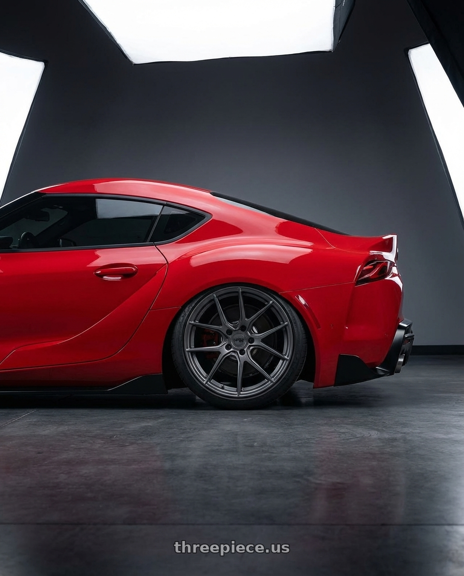 2023 Toyota GR Supra with Niche 1PC M116 MISANO 5X112 19X8.5 +25 MATTE GUN METAL wheels rear three quarter view slight stretch tires