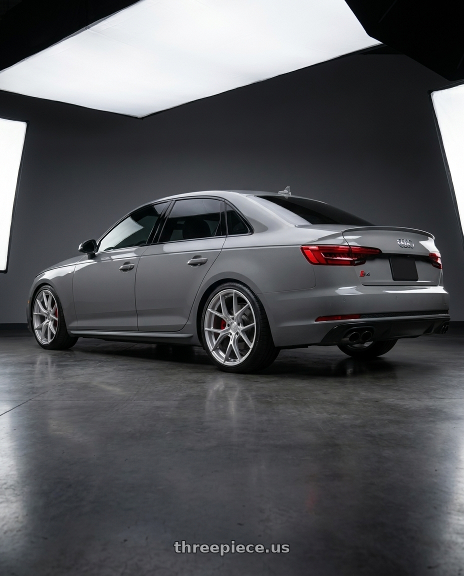 2019 Audi s4 with Aodhan AH-11 5x112 18x8.5+35 Gloss Silver Machined Face wheels rear three quarter view square tires