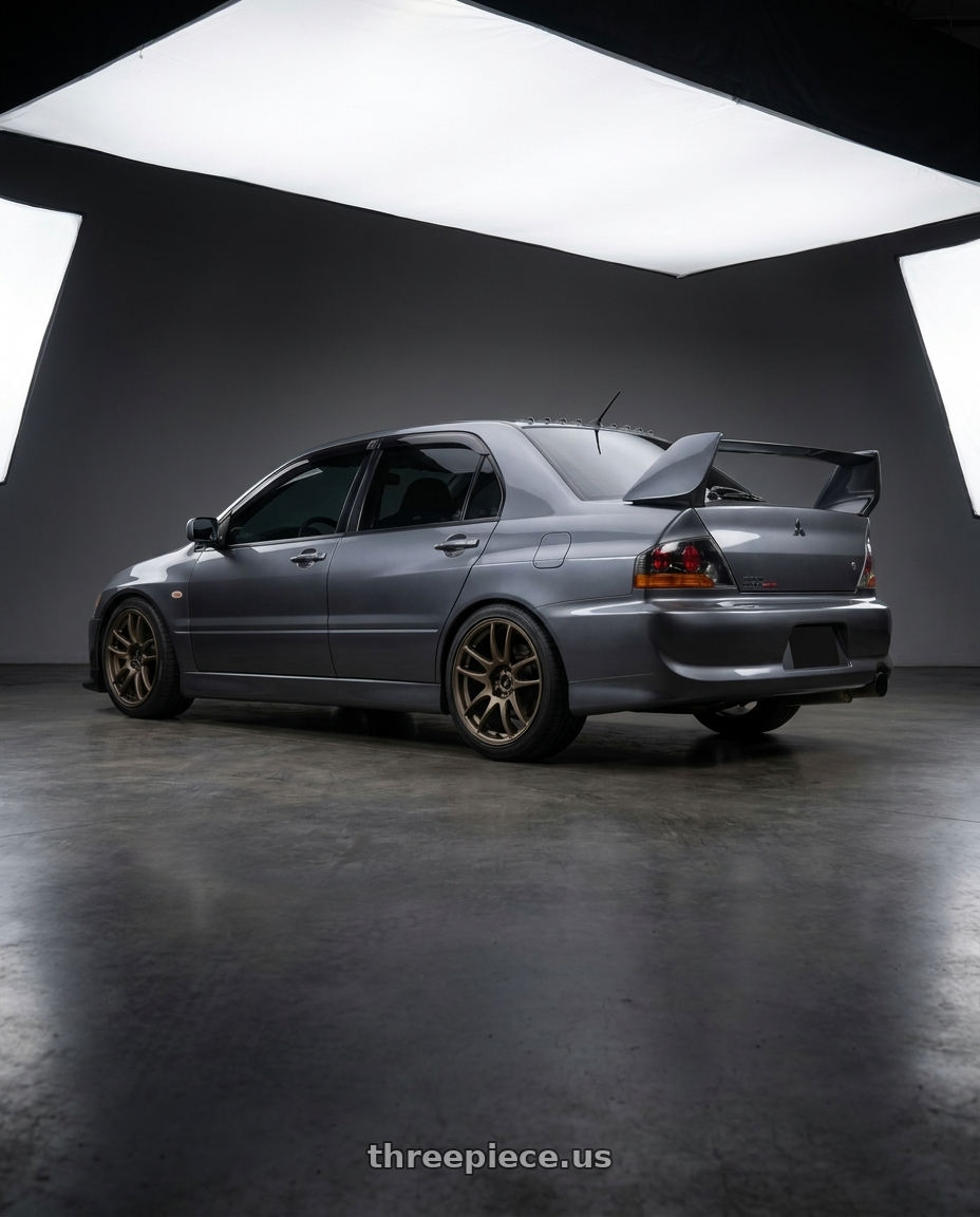 2005 Mitsubishi lancer evo with Work Emotion Cr Kiwami 5x114.3 17x9 +28 Matte Bronze wheels rear three quarter view square tires