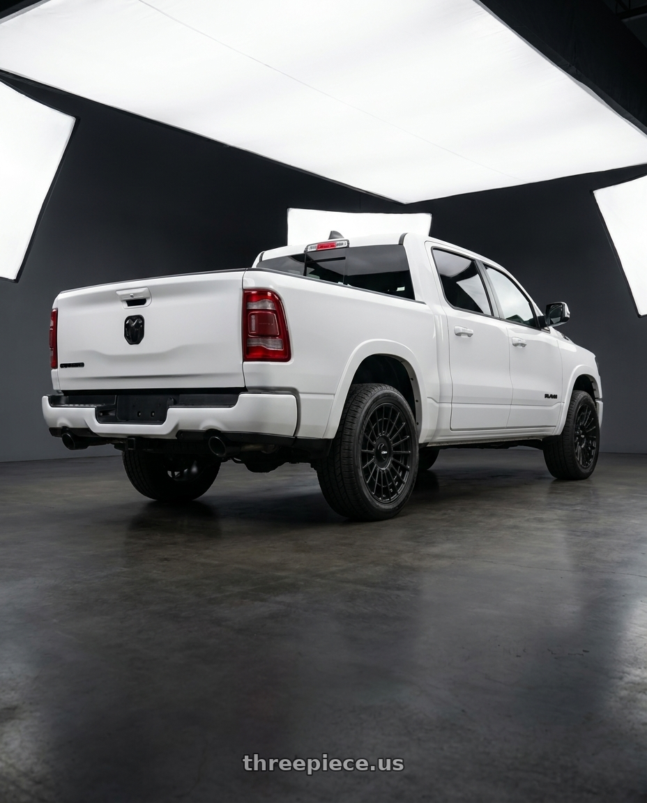 2026 Ram 1500 GT Sport with Rotiform LAS-R BLANK 17x9 +30 Matte Black wheels rear three quarter view square tires