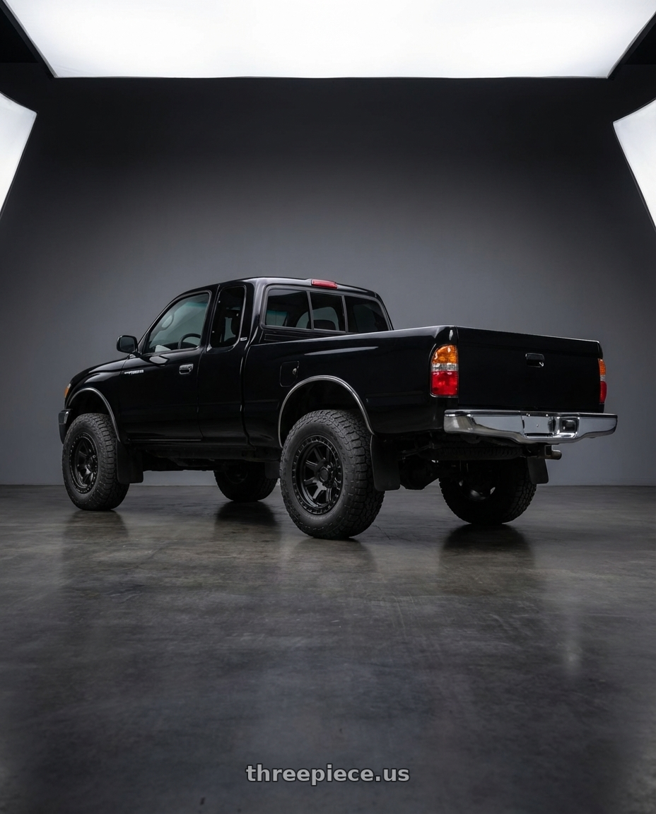 1999 toyota tacoma with Black Rhino CALICO 5X120 17X8.5 +34 MATTE BLACK wheels rear three quarter view meaty tires