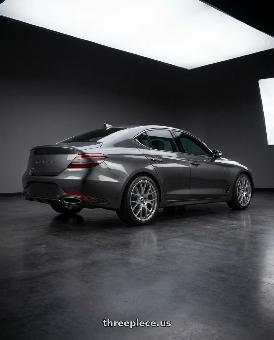 2023 Genesis G70 makalu grey with Enkei Raijin 5x100 18x8+35 Hyper Silver wheels rear three quarter view square tires