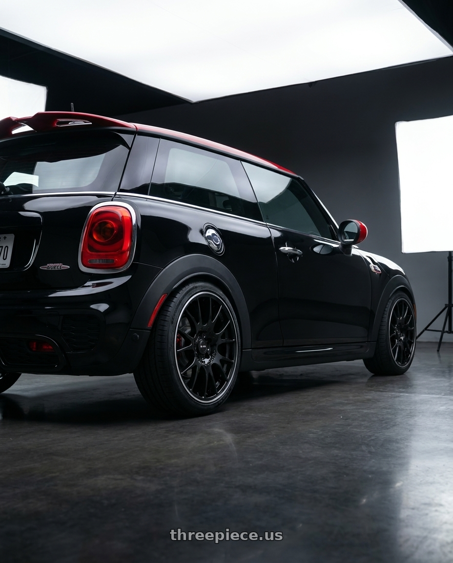 2017 mini John cooper works with Vors TR14 5x112 18x8 +35 Black w Machined Ring wheels rear three quarter view square tires